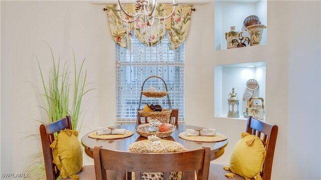 1133 Van Loon Commons Cir Unit 202, Cape Coral, FL 33909 - dining area featuring a chandelier