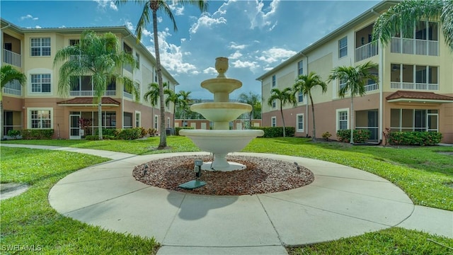 1133 Van Loon Commons Cir Unit 202, Cape Coral, FL 33909 - surrounding community featuring a lawn