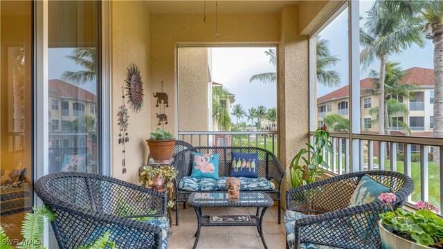 1133 Van Loon Commons Cir Unit 202, Cape Coral, FL 33909 - sunroom / solarium featuring an outdoor living space