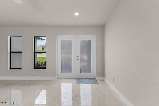 2510 SW 17th Ave, Cape Coral, FL 33914 - entrance foyer with light marble finish flooring, french doors, and recessed lighting