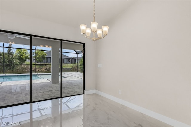 2510 SW 17th Ave, Cape Coral, FL 33914 - empty room featuring a chandelier, marble tiled flooring, and vaulted ceiling
