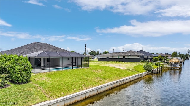 2510 SW 17th Ave, Cape Coral, FL 33914 - dock area featuring a water view, a lawn, and glass enclosure