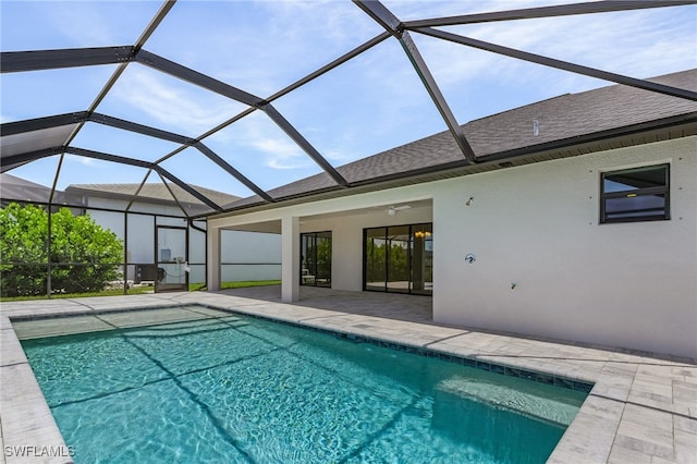 2510 SW 17th Ave, Cape Coral, FL 33914 - swimming pool featuring a patio area, glass enclosure, and ceiling fan