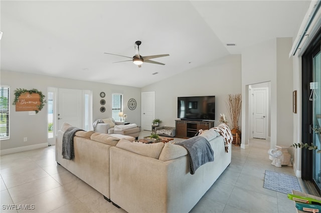 1028 NW 33rd Ave, Cape Coral, FL 33993 - living room with ceiling fan, lofted ceiling, and light tile patterned floors
