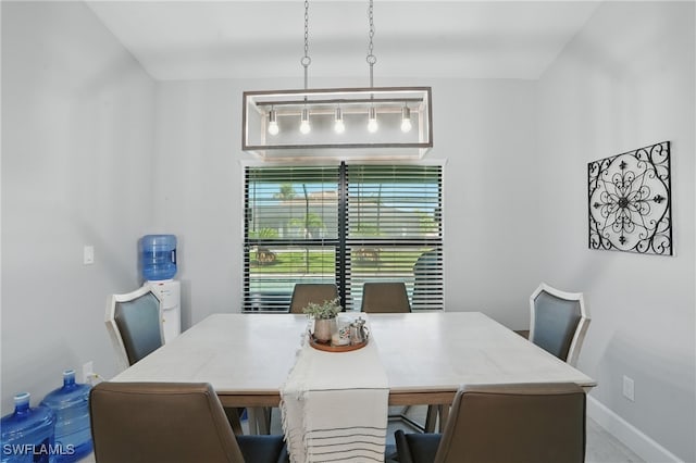 1028 NW 33rd Ave, Cape Coral, FL 33993 - dining area featuring baseboards