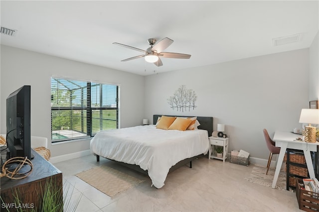 1028 NW 33rd Ave, Cape Coral, FL 33993 - bedroom with baseboards and ceiling fan