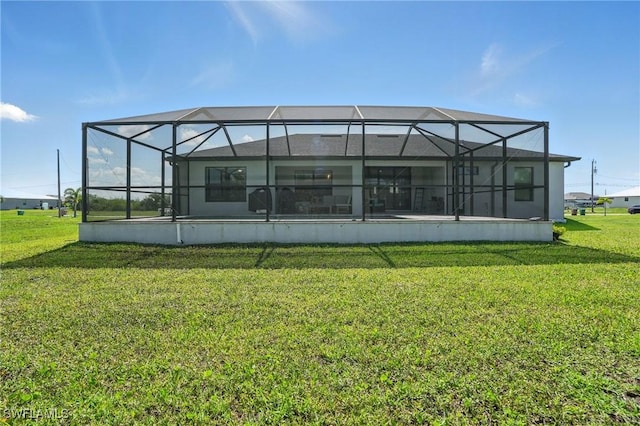 1028 NW 33rd Ave, Cape Coral, FL 33993 - back of house featuring a yard