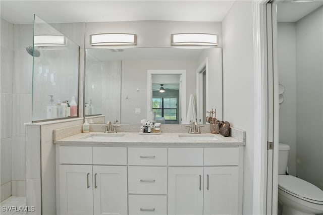 1028 NW 33rd Ave, Cape Coral, FL 33993 - bathroom featuring walk in shower, double vanity, and ceiling fan