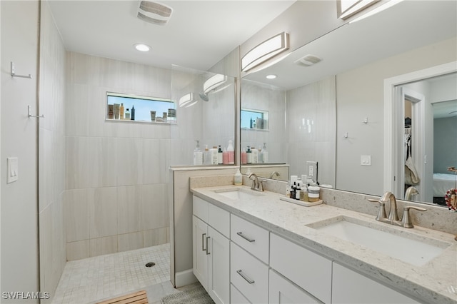 1028 NW 33rd Ave, Cape Coral, FL 33993 - full bathroom featuring a walk in shower and double vanity