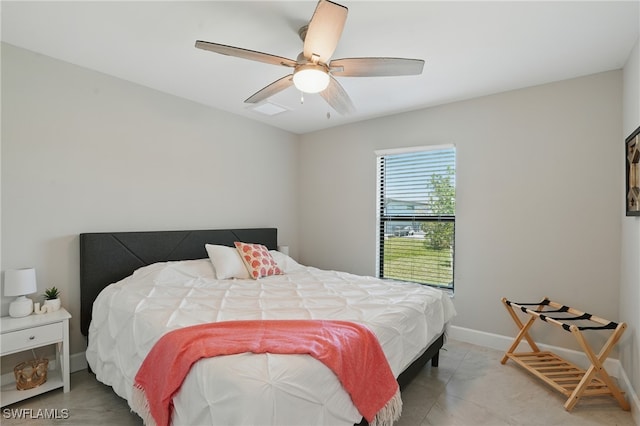 1028 NW 33rd Ave, Cape Coral, FL 33993 - bedroom featuring baseboards and a ceiling fan