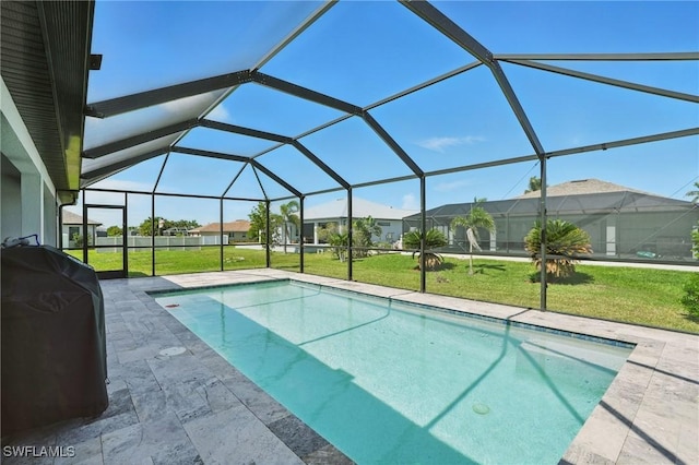 1028 NW 33rd Ave, Cape Coral, FL 33993 - outdoor pool featuring a lawn, a residential view, a lanai, and a patio