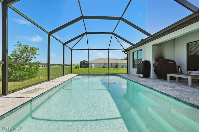 1028 NW 33rd Ave, Cape Coral, FL 33993 - outdoor pool featuring a lawn, a patio, grilling area, and a lanai