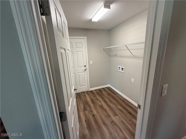 2343 Briarwood St, Punta Gorda, FL 33980 - laundry room featuring dark wood finished floors, hookup for a washing machine, and a textured ceiling