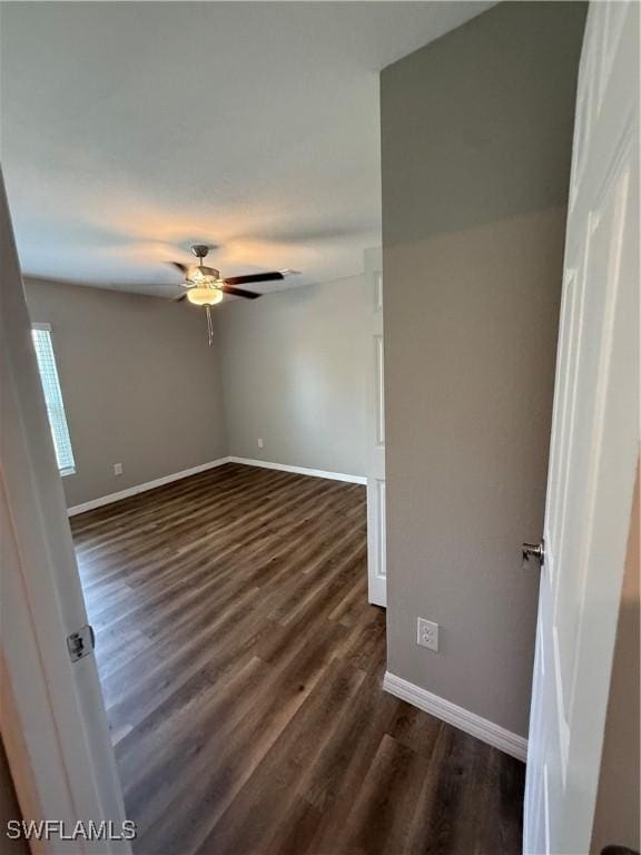 2343 Briarwood St, Punta Gorda, FL 33980 - spare room featuring a ceiling fan and dark wood finished floors