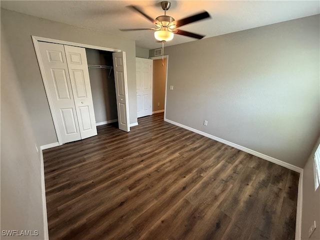 2343 Briarwood St, Punta Gorda, FL 33980 - unfurnished bedroom with dark wood-style flooring, a closet, and ceiling fan