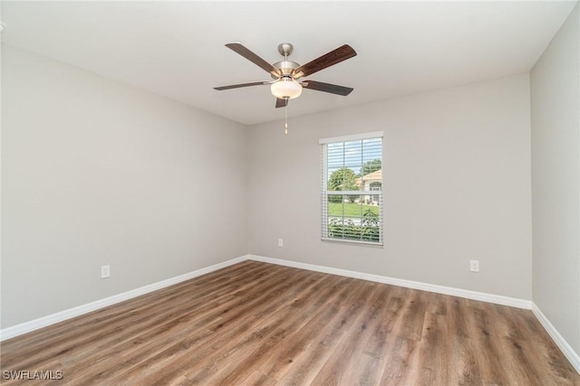 2343 Briarwood St, Punta Gorda, FL 33980 - empty room featuring wood finished floors and ceiling fan