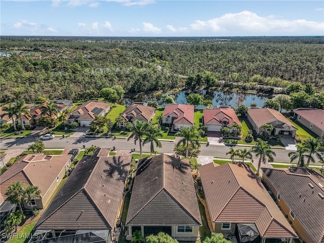 20571 Long Pond Rd, North Fort Myers, FL 33917 - aerial view of residential area featuring a heavily wooded area and a nearby body of water