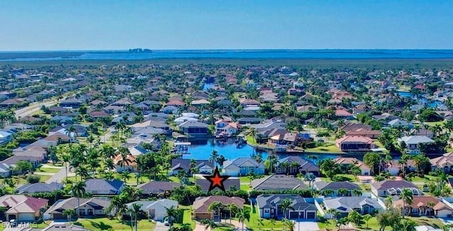 2127 SW 49th Ter, Cape Coral, FL 33914 - aerial perspective of suburban area featuring a large body of water