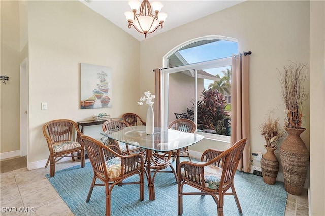 2127 SW 49th Ter, Cape Coral, FL 33914 - dining area featuring a chandelier, light tile patterned flooring, and vaulted ceiling