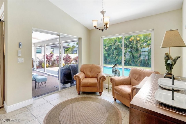 2127 SW 49th Ter, Cape Coral, FL 33914 - living area featuring a chandelier, vaulted ceiling, and light tile patterned floors