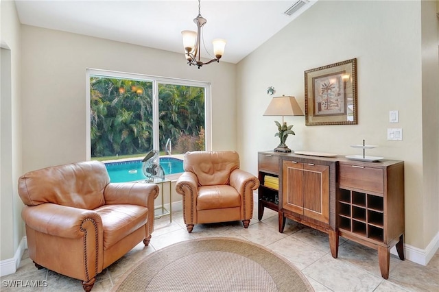 2127 SW 49th Ter, Cape Coral, FL 33914 - living area with a chandelier and light tile patterned flooring