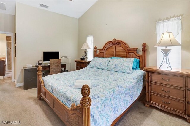 2127 SW 49th Ter, Cape Coral, FL 33914 - bedroom featuring light carpet and vaulted ceiling