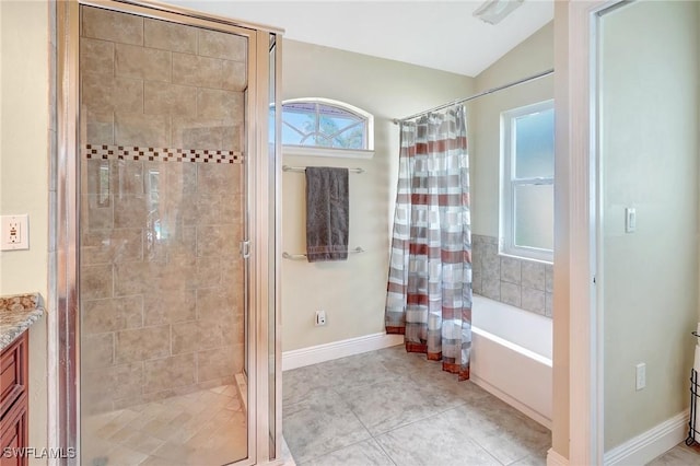 2127 SW 49th Ter, Cape Coral, FL 33914 - full bathroom featuring lofted ceiling, healthy amount of natural light, vanity, and tile patterned flooring