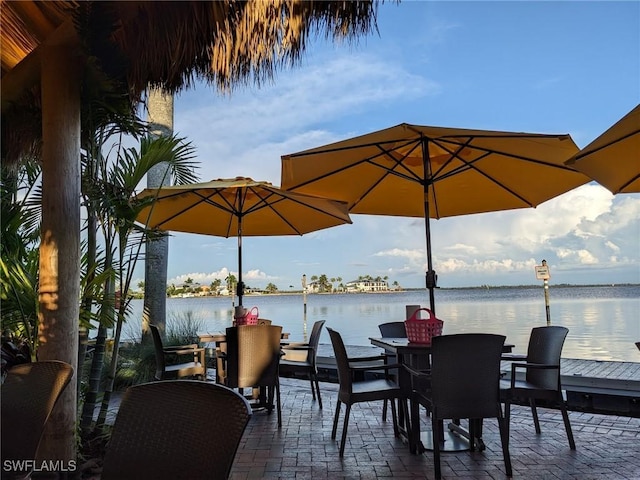 2127 SW 49th Ter, Cape Coral, FL 33914 - view of patio with a water view