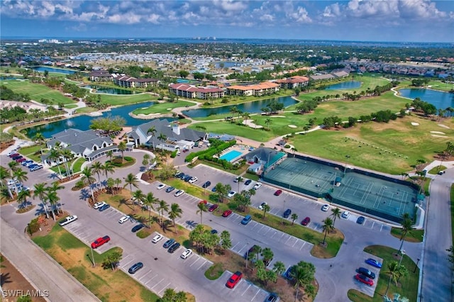 12170 Kelly Greens Blvd Unit 88, Fort Myers, FL 33908 - aerial view of property and surrounding area featuring a large body of water, a local golf course, and nearby suburban area