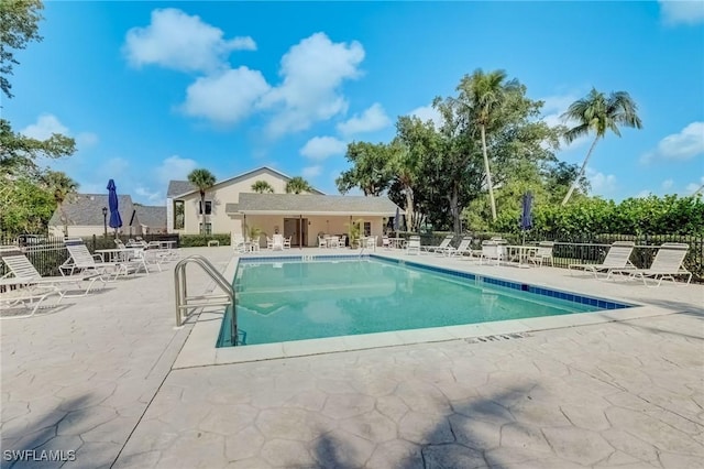 12170 Kelly Greens Blvd Unit 88, Fort Myers, FL 33908 - community pool featuring a patio