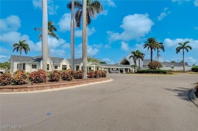 12170 Kelly Greens Blvd Unit 88, Fort Myers, FL 33908 - view of building exterior featuring uncovered parking