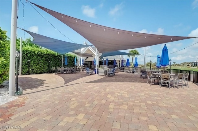 12170 Kelly Greens Blvd Unit 88, Fort Myers, FL 33908 - view of patio featuring outdoor dining space