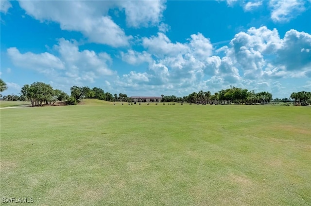12170 Kelly Greens Blvd Unit 88, Fort Myers, FL 33908 - surrounding community with a yard