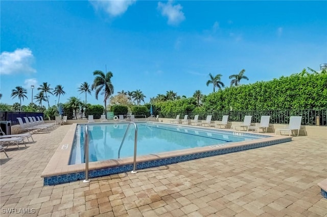 12170 Kelly Greens Blvd Unit 88, Fort Myers, FL 33908 - community pool featuring a patio