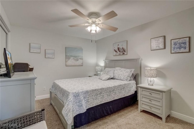 12170 Kelly Greens Blvd Unit 88, Fort Myers, FL 33908 - bedroom featuring light colored carpet and a ceiling fan