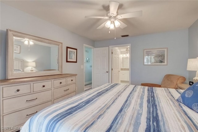 12170 Kelly Greens Blvd Unit 88, Fort Myers, FL 33908 - bedroom with connected bathroom and a ceiling fan