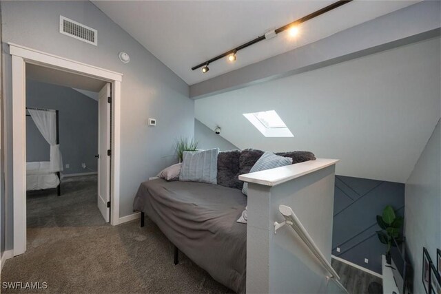13405 Fox Chapel Ct, Fort Myers, FL 33919 - carpeted living room featuring a skylight and lofted ceiling
