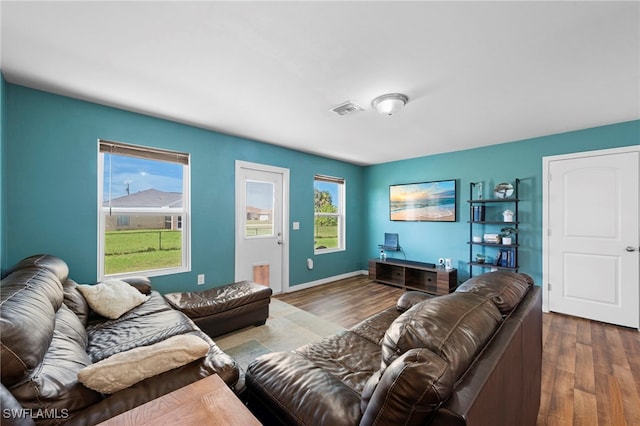 1100 NW 20th St, Cape Coral, FL 33993 - living area with wood finished floors and baseboards
