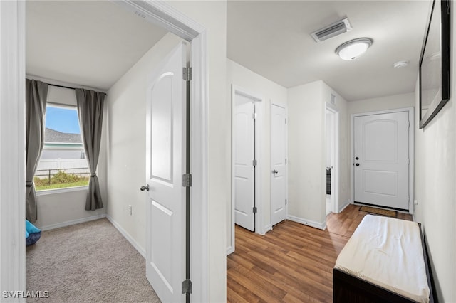 1100 NW 20th St, Cape Coral, FL 33993 - hall featuring baseboards and wood finished floors