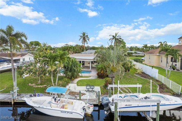 1442 Wellington Ct, Cape Coral, FL 33904 - dock area featuring boat lift and a water view