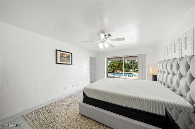 1442 Wellington Ct, Cape Coral, FL 33904 - bedroom with access to outside and a ceiling fan