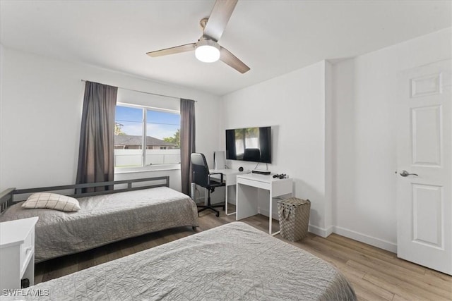 605 SW 18th Ter, Cape Coral, FL 33991 - bedroom featuring light wood-style flooring and a ceiling fan