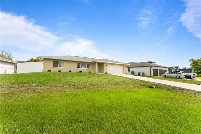 605 SW 18th Ter, Cape Coral, FL 33991 - ranch-style house featuring a garage, concrete driveway, and stucco siding