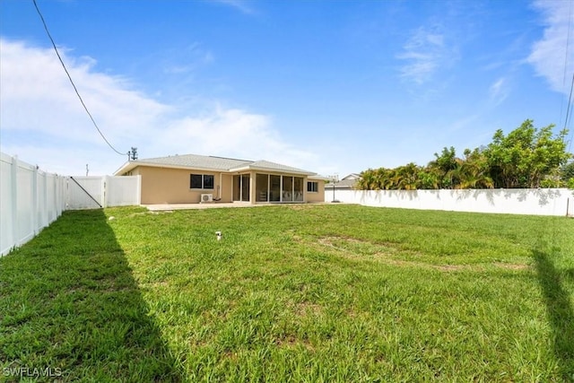 605 SW 18th Ter, Cape Coral, FL 33991 - rear view of house featuring a sunroom, a fenced backyard, a patio area, and stucco siding