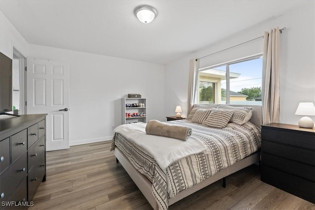 605 SW 18th Ter, Cape Coral, FL 33991 - bedroom with light wood finished floors