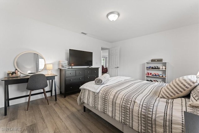 605 SW 18th Ter, Cape Coral, FL 33991 - bedroom with wood finished floors