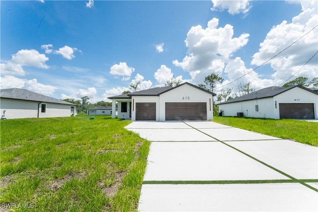 615 Greenbriar Blvd, Lehigh Acres, FL 33972 - ranch-style house featuring a front yard, concrete driveway, stucco siding, and a garage