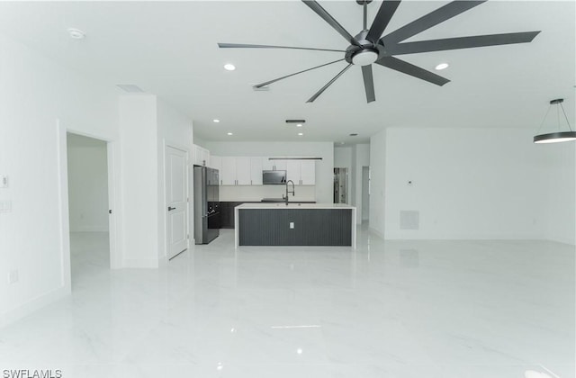 615 Greenbriar Blvd, Lehigh Acres, FL 33972 - unfurnished living room featuring recessed lighting, a ceiling fan, and light marble finish flooring