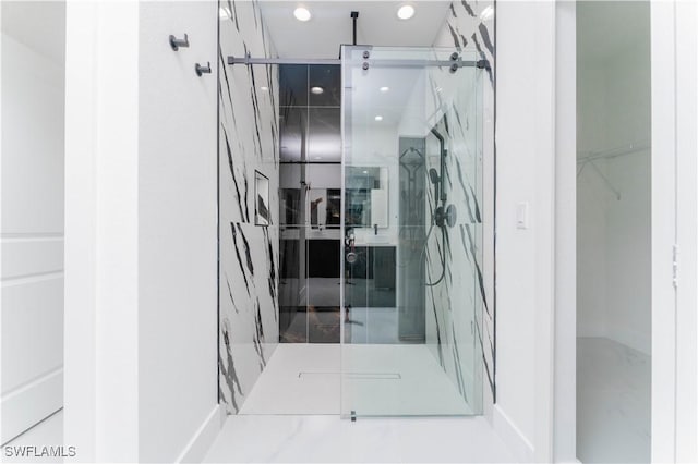 615 Greenbriar Blvd, Lehigh Acres, FL 33972 - full bathroom featuring a marble finish shower, a spacious closet, and recessed lighting