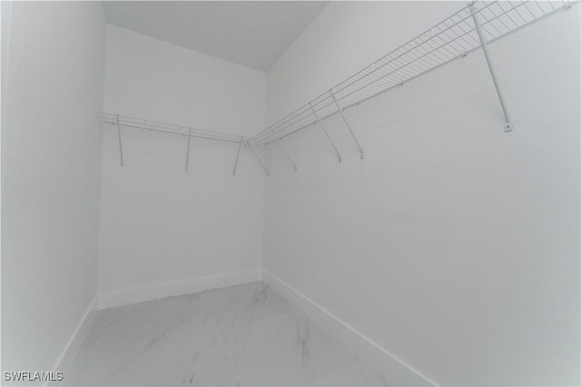 615 Greenbriar Blvd, Lehigh Acres, FL 33972 - spacious closet with light marble finish floors